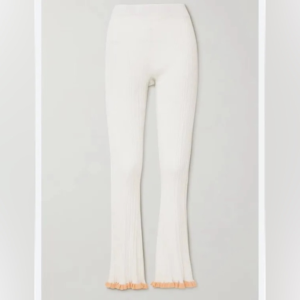 HOLZWEILER Dahlia ruffled ribbed-knit flared pants in Ecru colorway